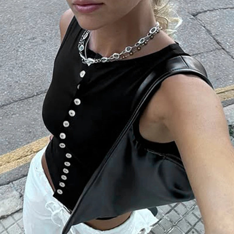 Women's button-up backless tank top in a solid color with a short length.