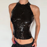 Black sequin top worn by a model