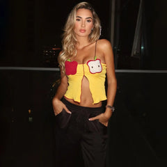 Women's fruit embroidery split crop top with backless detail.