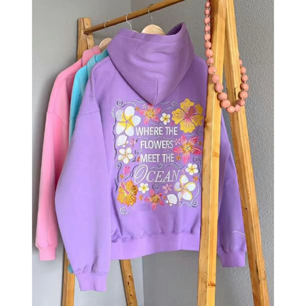 Women's floral letter embroidery hoodie with a loose fit and kangaroo pocket.