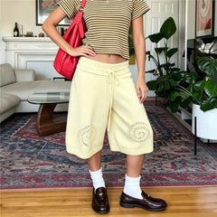 Hollow Swirl Embroidery Drawstring Wide Leg Capri Pants