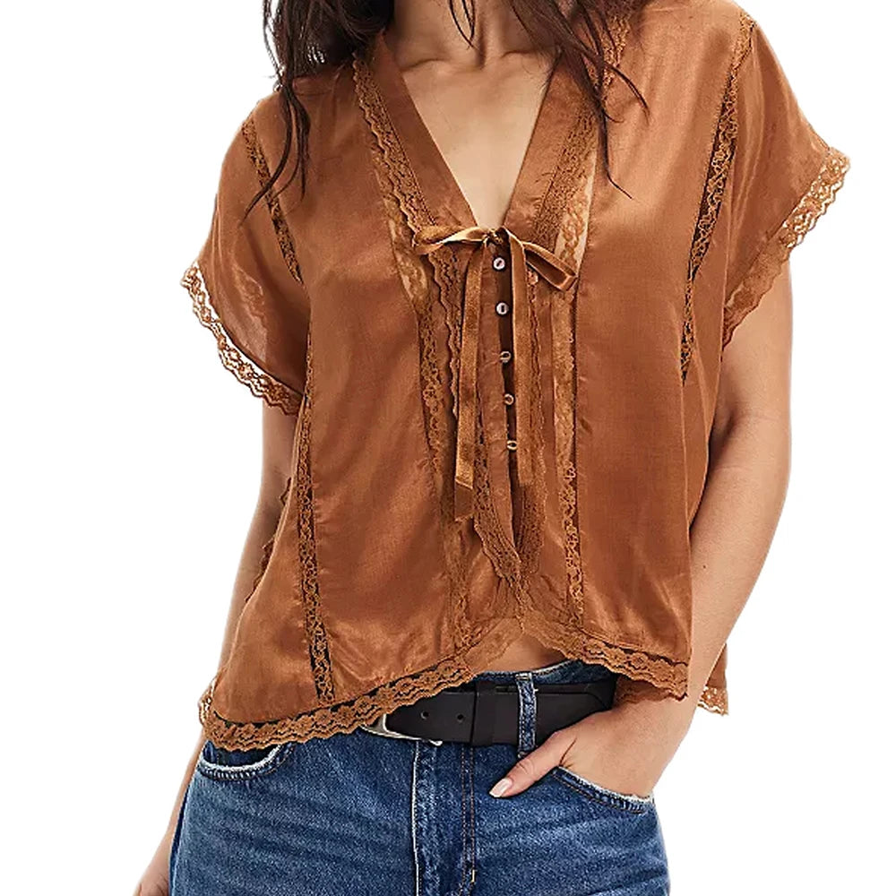 Brown lace-up top worn by a person