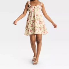 Woman wearing a floral dress- front
