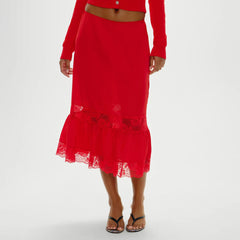Red lace skirt worn by a person
