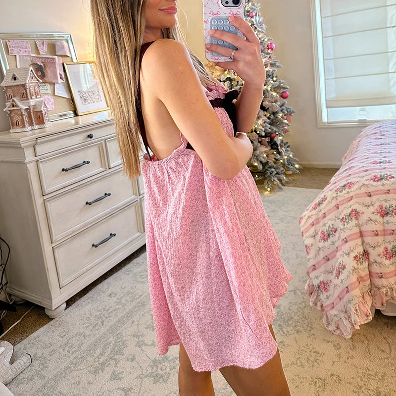 Women's tie-up ruffle print babydoll mini dress with square collar.