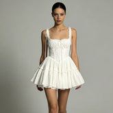 White Lace Up Spaghetti Strap Tiered Flared Mini Dress
