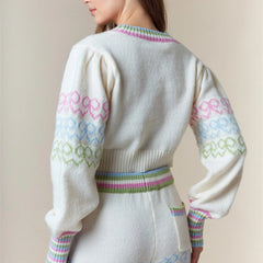 White sweater with colorful patterns