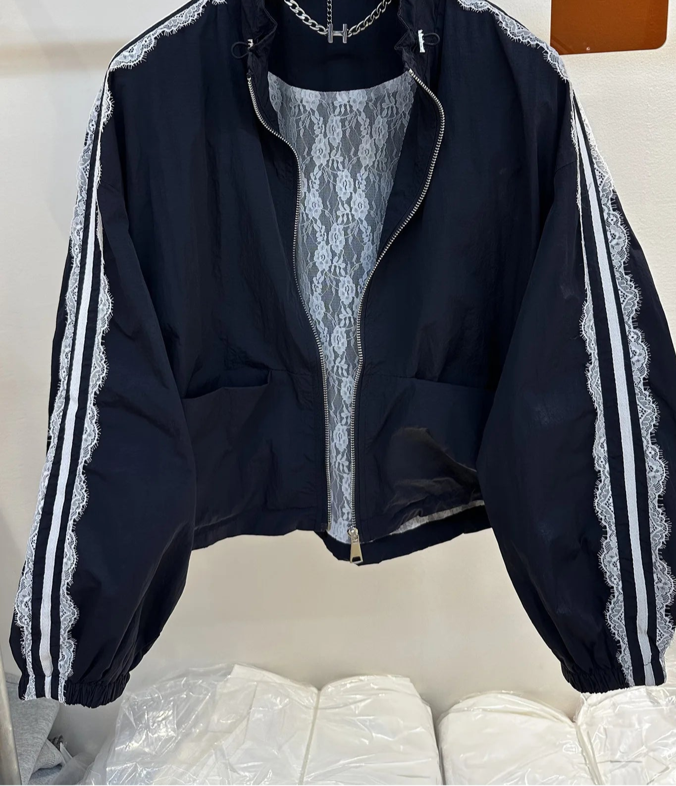 Black jacket with white stripes