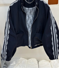 Black jacket with white stripes