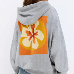 Gray hoodie with a colorful flower design on the back