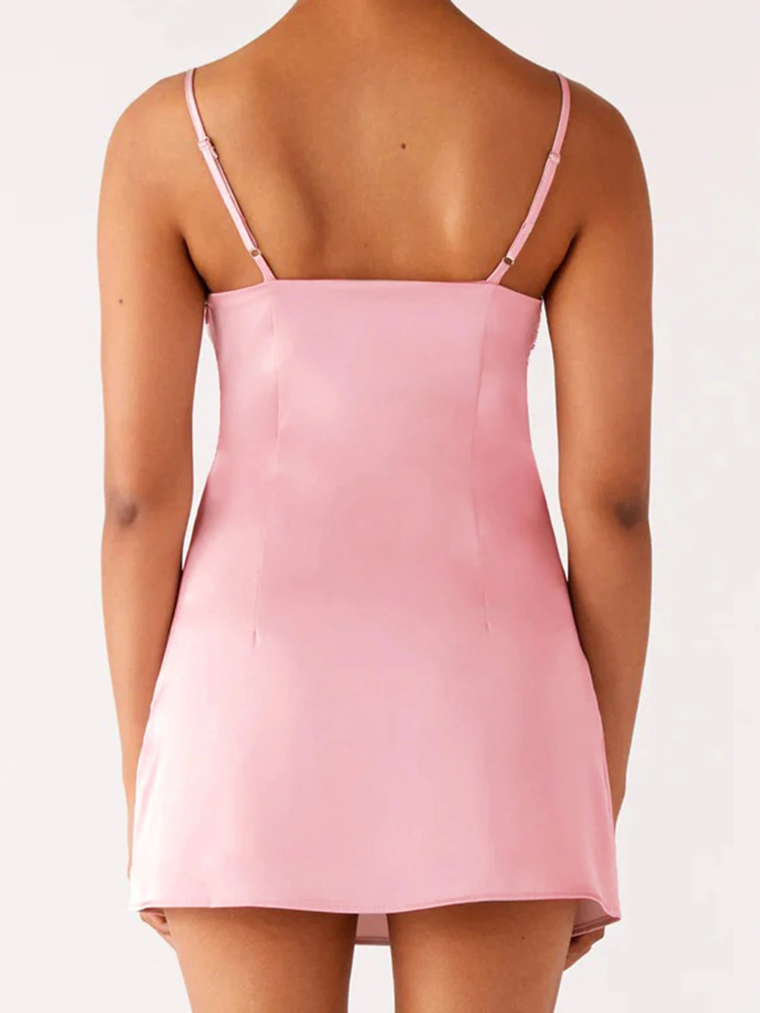 Pink slip dress worn by a person- back