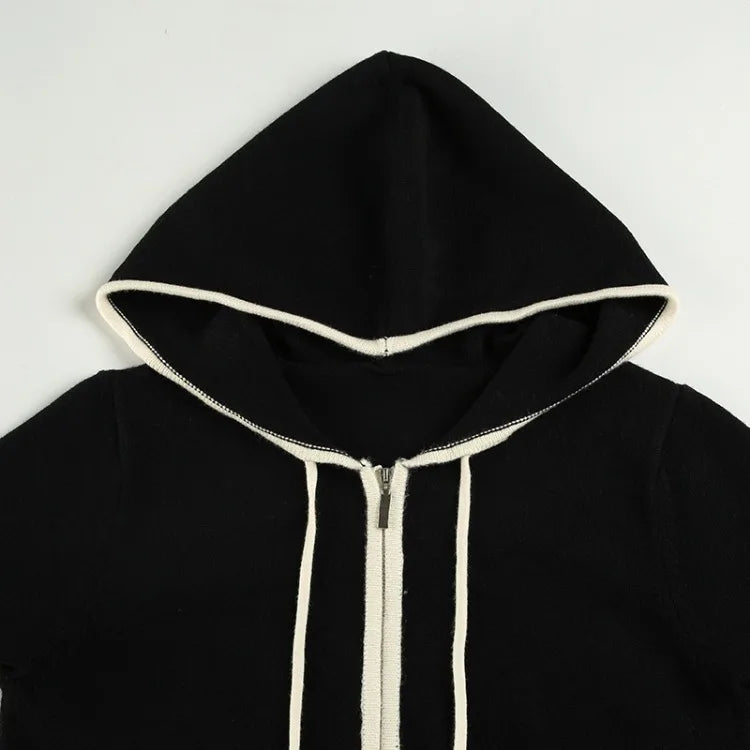 Black hoodie with white trim on a light gray background