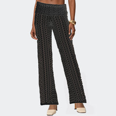 Patterned pants worn by a person on a light gray background