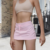 Women's effortless solid drawstring mini skirt.