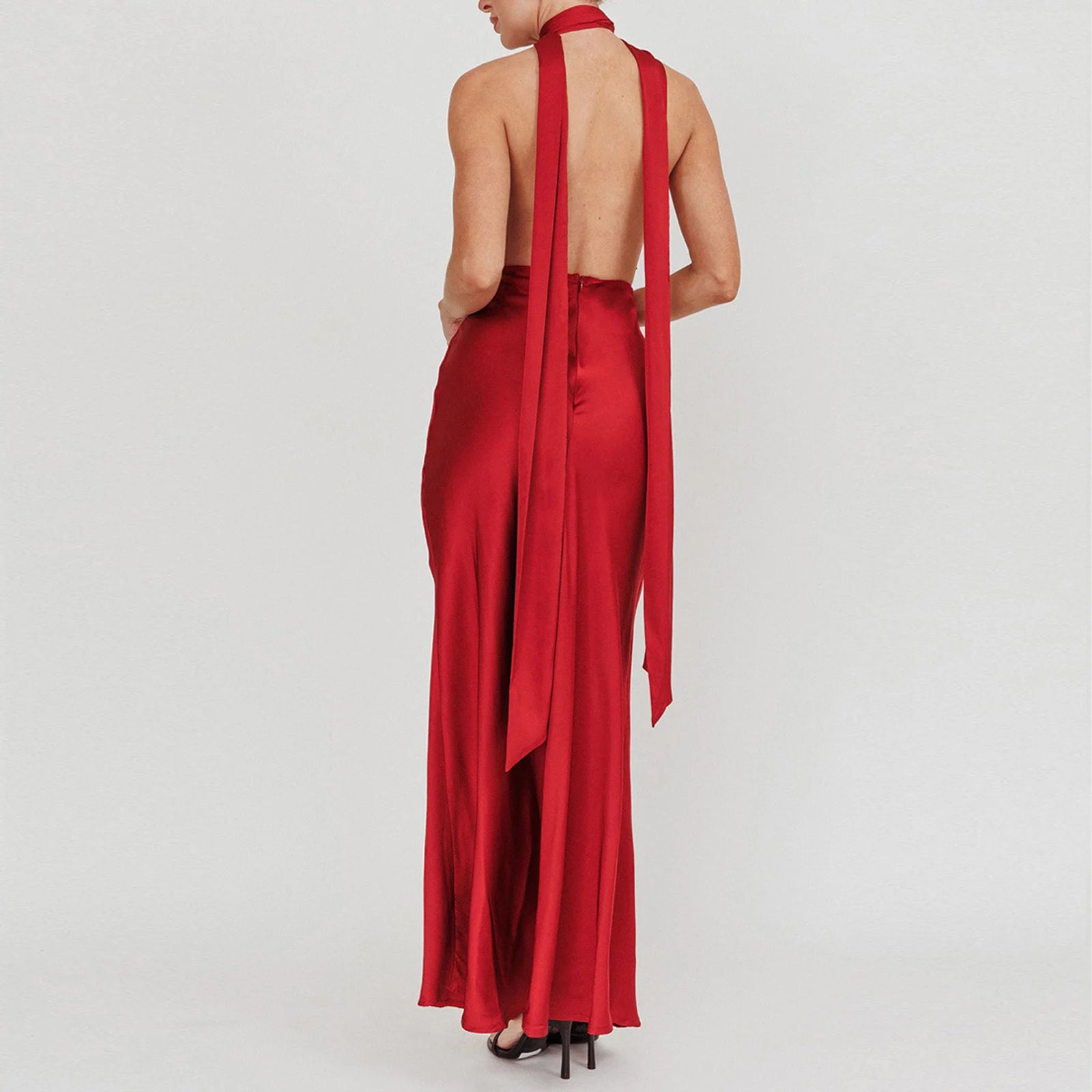 Red halter neck dress with open back - back view