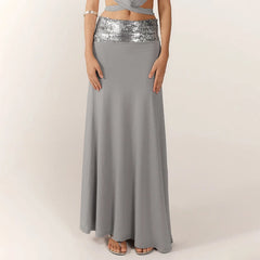 Gray maxi skirt with silver sequin waistband on a plain background