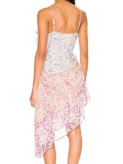 Woman wearing a floral dress - back view