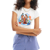 Person wearing a white t-shirt with a colorful lobster design