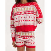 Red and white Christmas-themed pajama set with patterns on a plain background