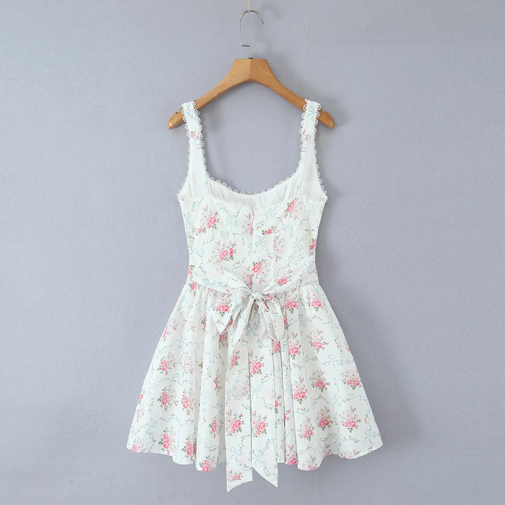 Women's white floral print back tie flare mini dress with turn-down collar and full sleeves.