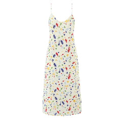 Colorful patterned slip dress on a white background