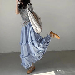 Women's blue ruffles plaid long skirt with A-line silhouette.