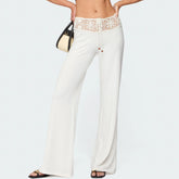 White wide-leg pants with lace detailing