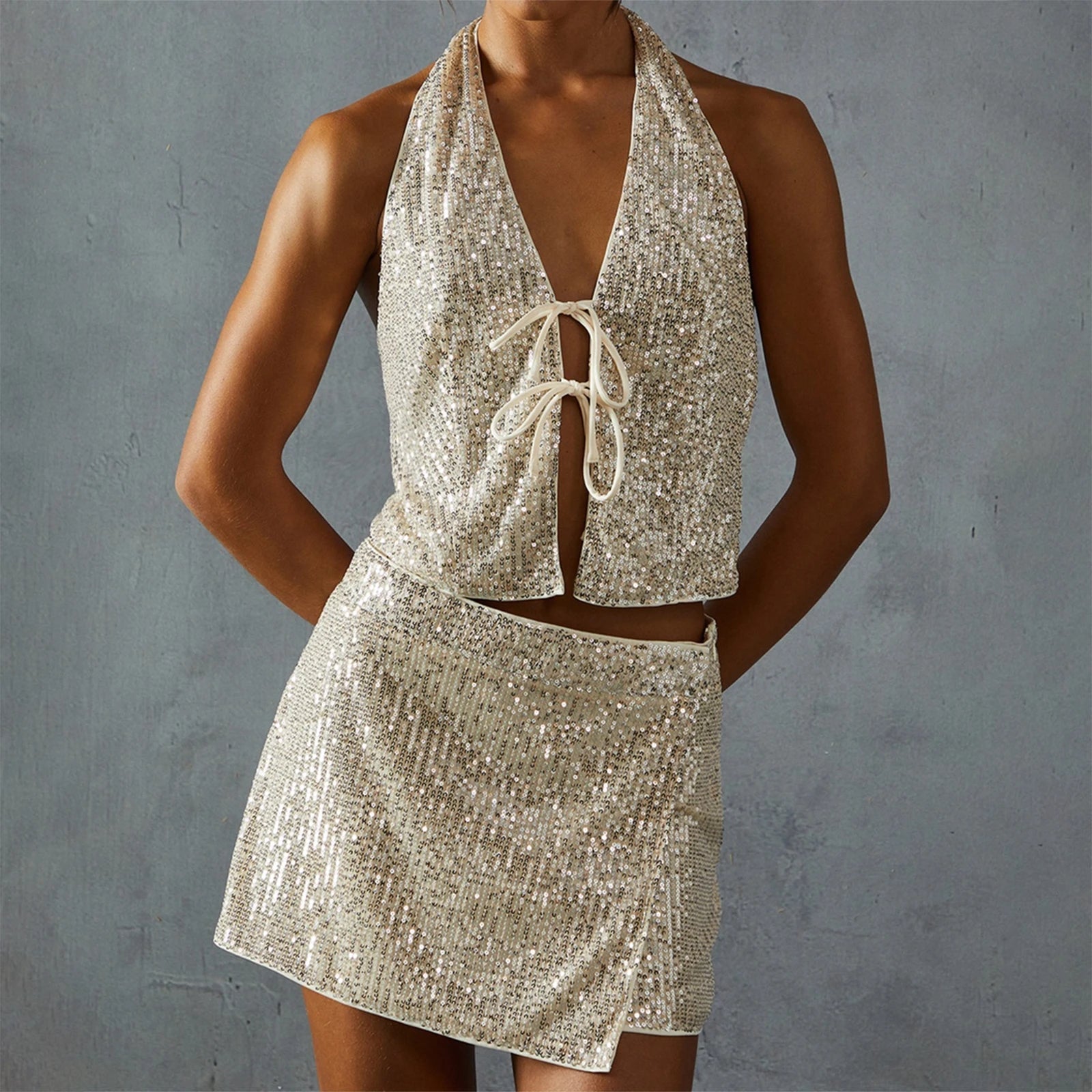 Woman wearing a sparkly two-piece outfit