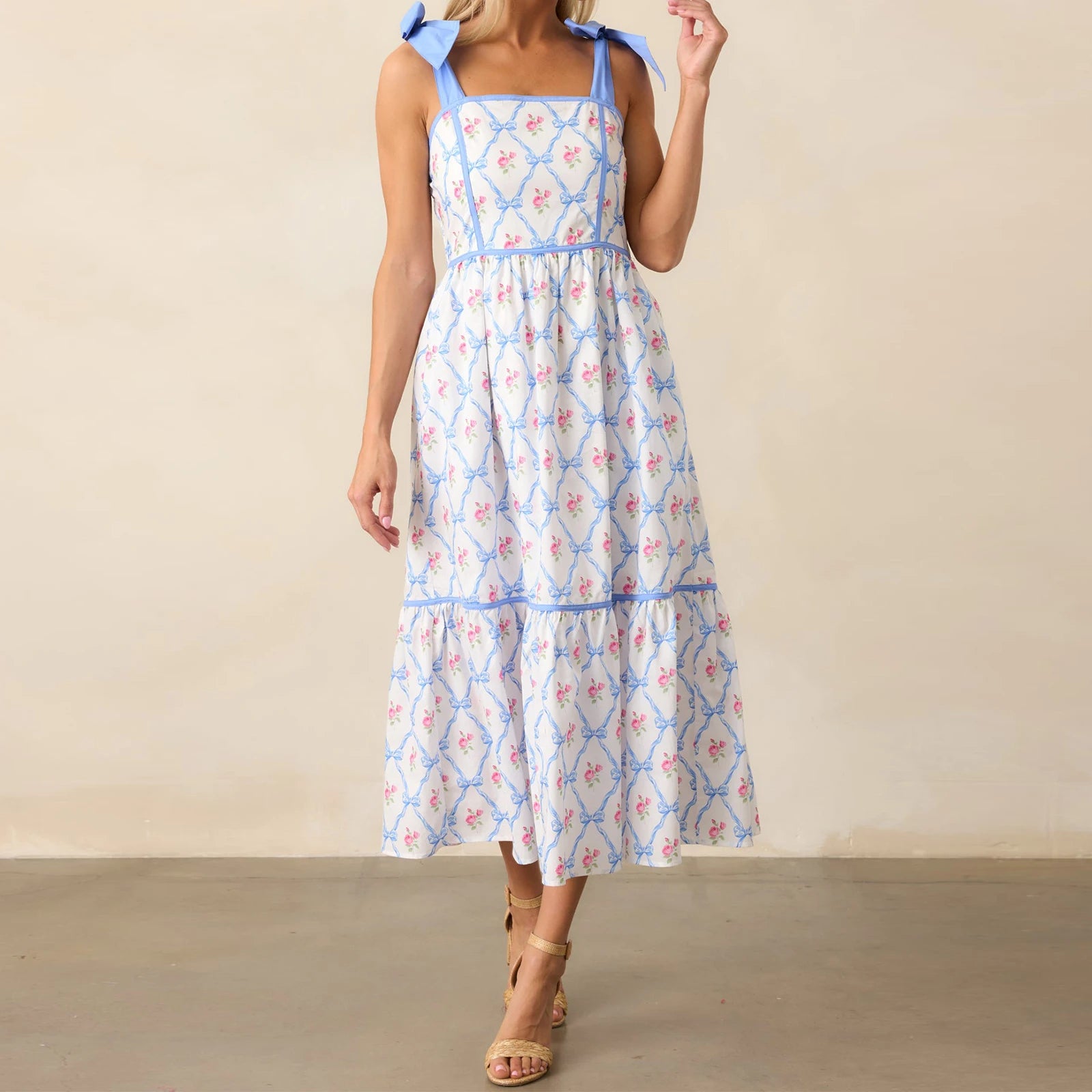 Women's printed tiered midi dress with square neck.