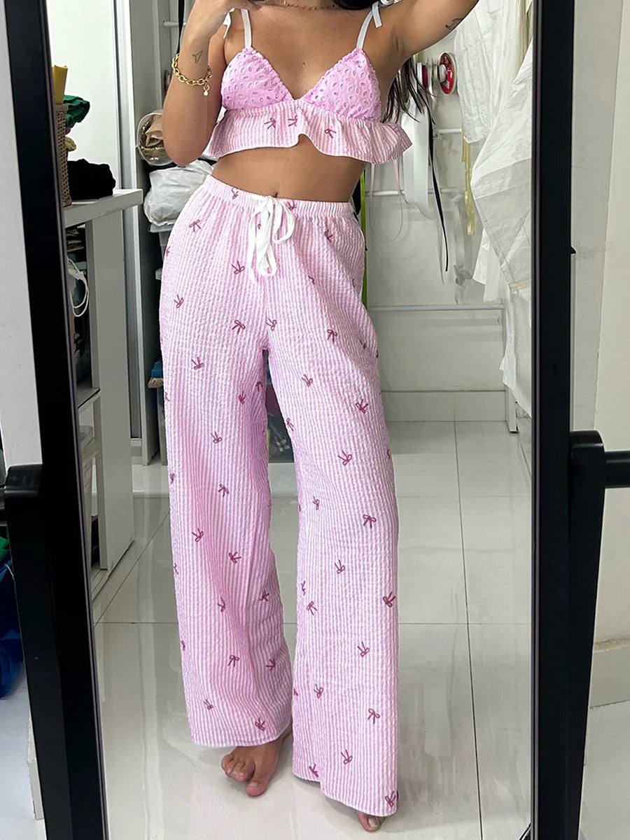 Women's pink striped high-waist lounge pants.