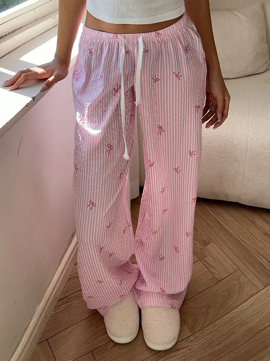 Women's pink striped high-waist lounge pants.