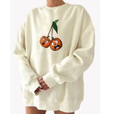 Beige sweatshirt with cartoon cherries design