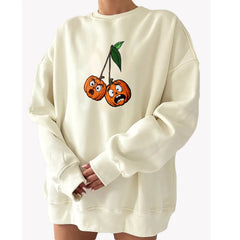 Beige sweatshirt with cartoon cherries design