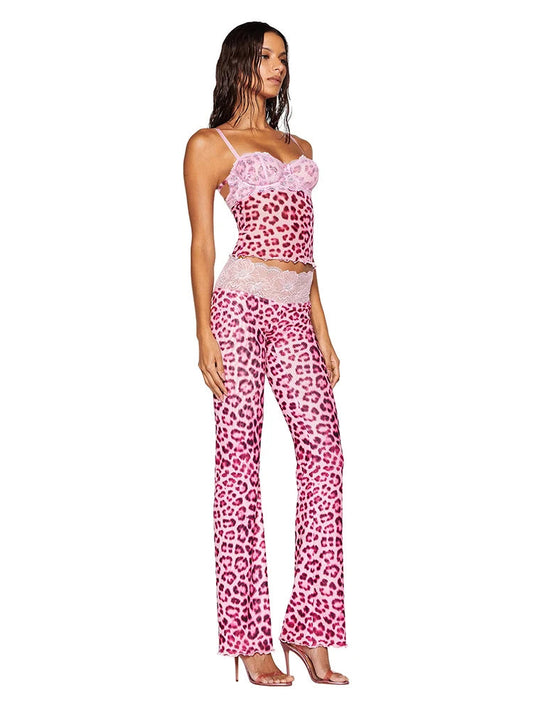 Woman wearing a pink leopard print outfit with 'kliou' branding.