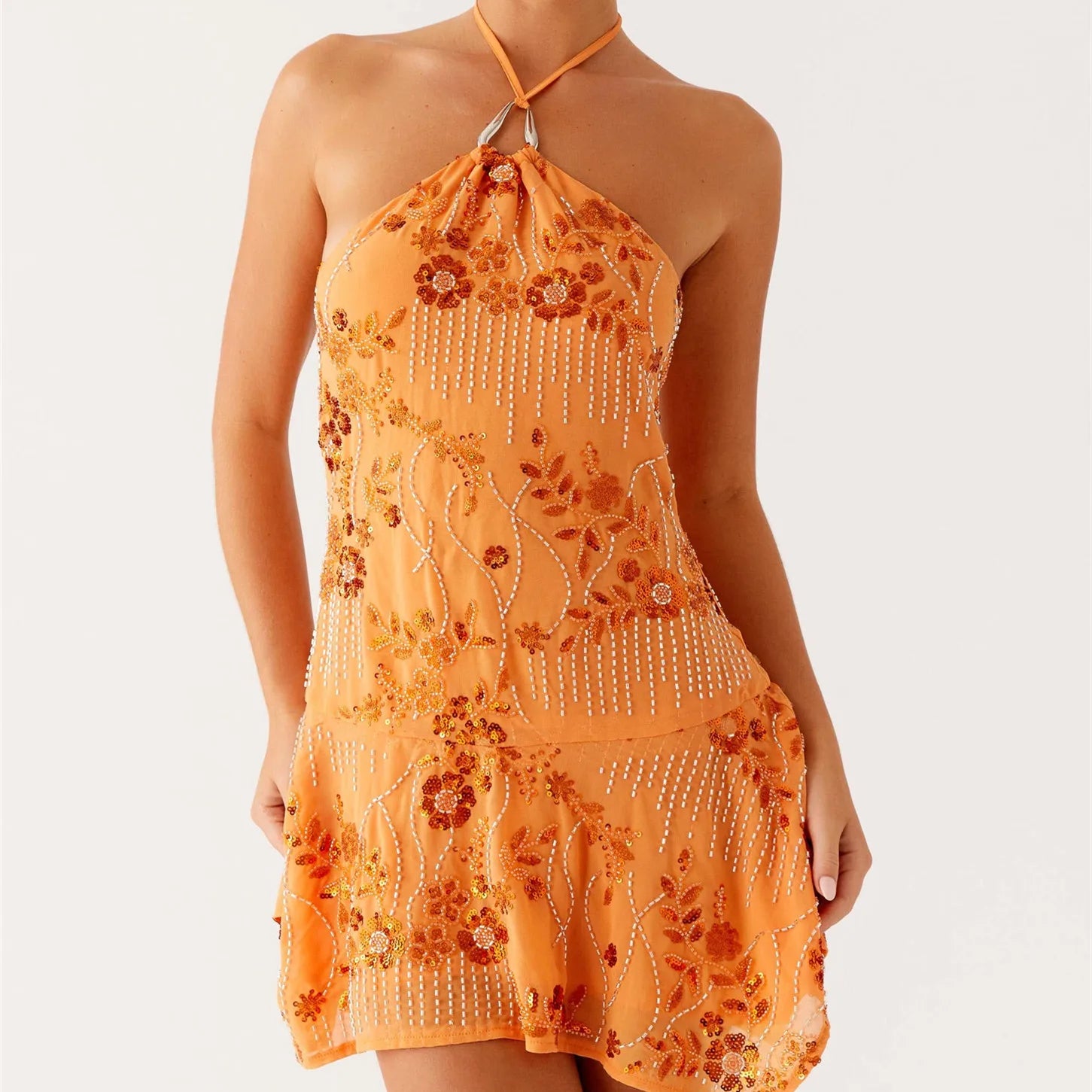 Orange halter neck dress with floral patterns