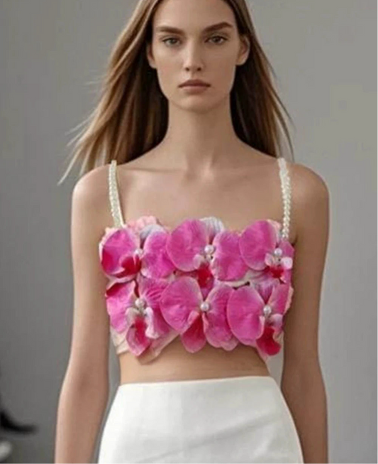 Women's pink 3D orchid pearl strap crop top.

