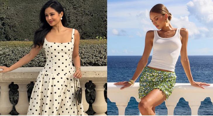 Two women in different outfits, one in a polka dot dress and the other in a white top and green shorts, standing on a balcony with scenic backgrounds.