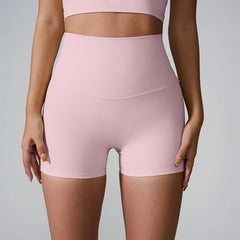 Person wearing pink ribbed shorts- full view
