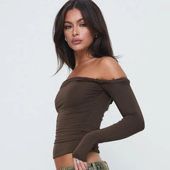 Woman wearing a brown off-shoulder top 