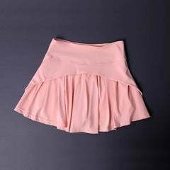 Pink skirt on a dark gray background