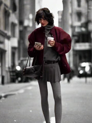 Women's baseball jacket in burgundy.