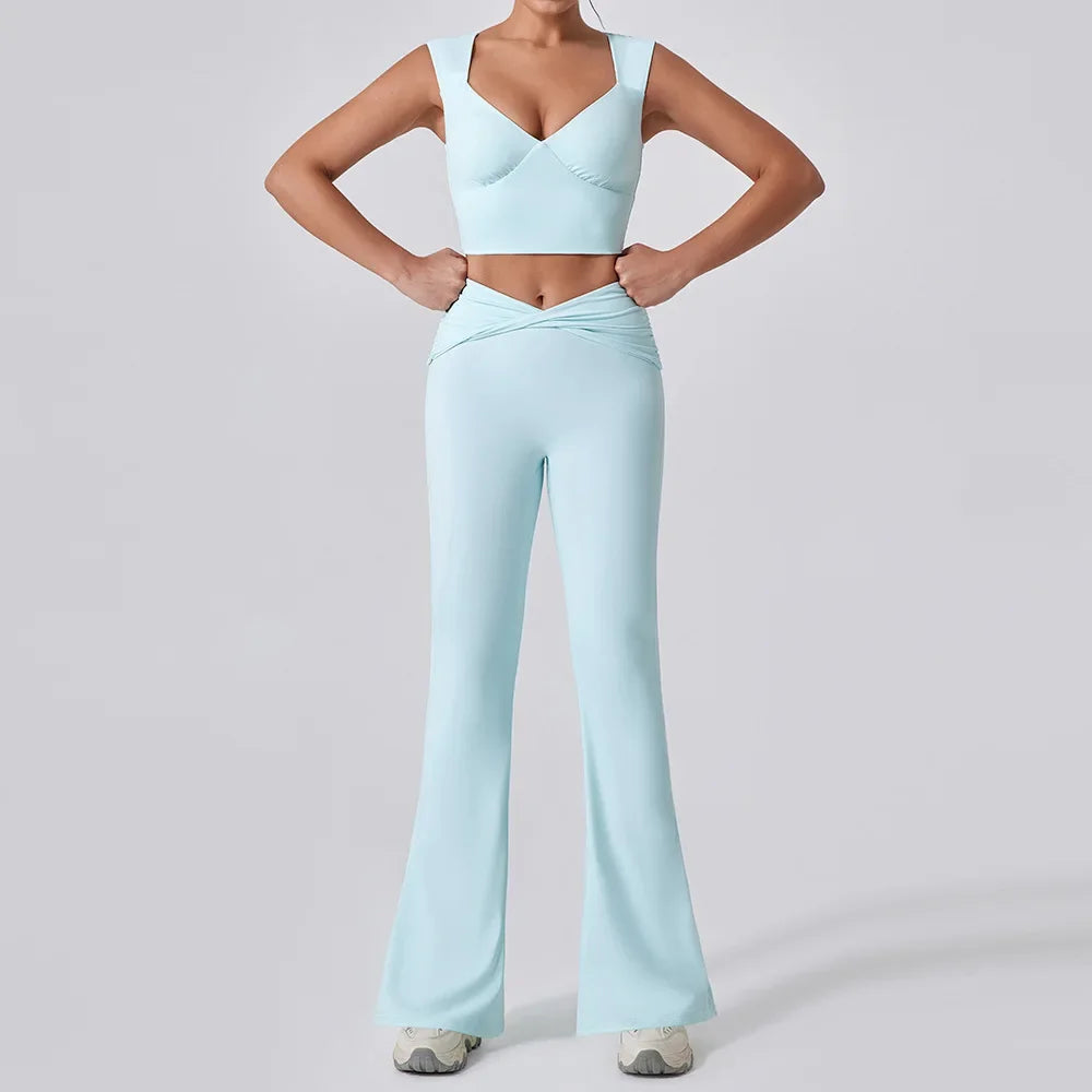 Person wearing a light blue athletic outfit on a plain background