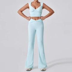 Person wearing a light blue athletic outfit on a plain background