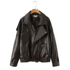 Brown leather jacket on a hanger 