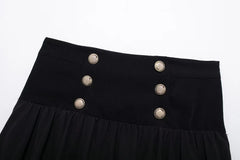 Women's black mini skirt with a balloon silhouette and gold buttons.