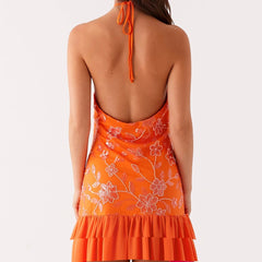 Orange dress with floral patterns 