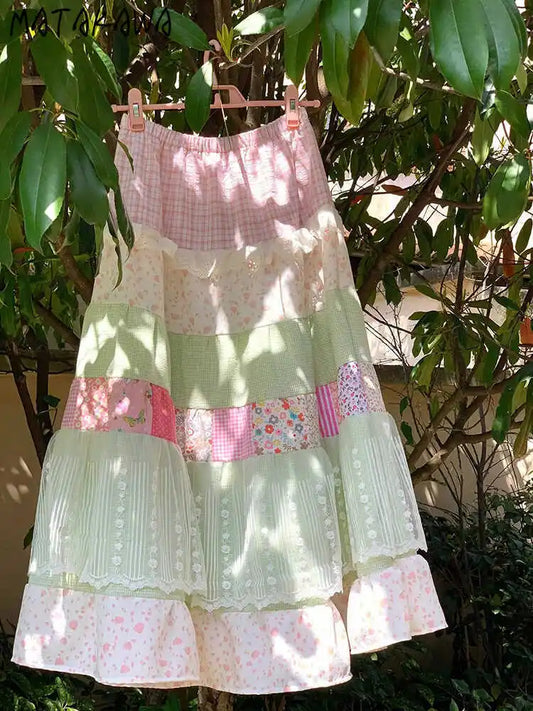Women's pastel colorful patchwork maxi skirt with A-line silhouette.

