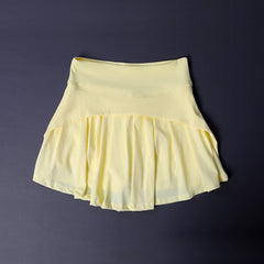 Yellow skirt on a dark purple background