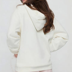 Person wearing a white hoodie