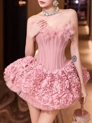 Woman wearing a pink floral dress with a blurred background